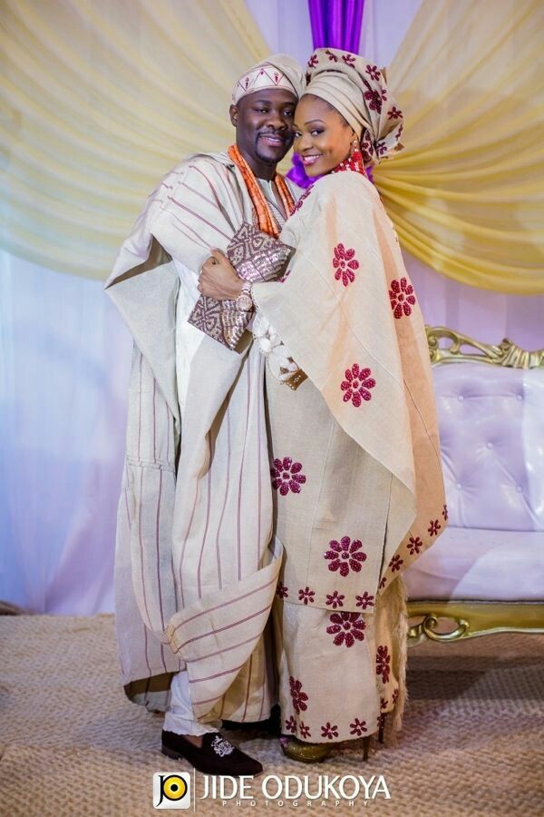 Milk color and purple Yoruba traditional wedding attire image